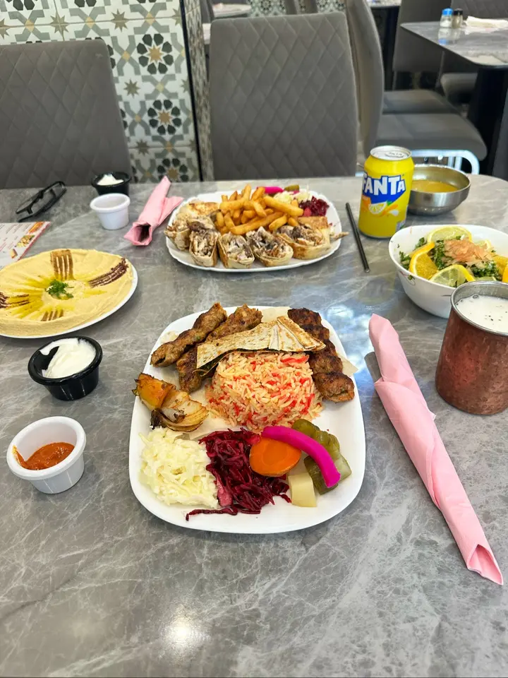 Table spread at Rosto Shawarma